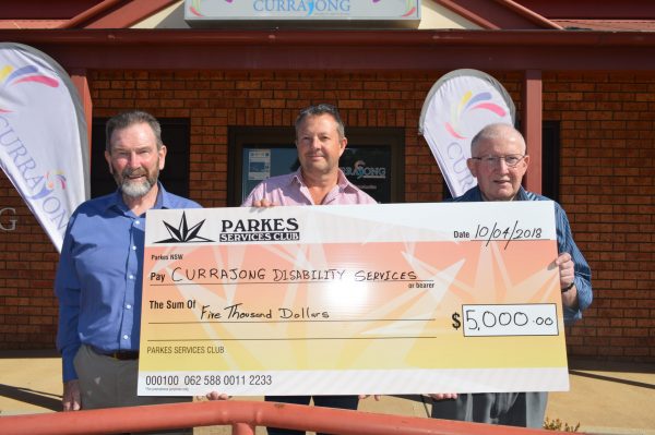 Parkes Services Club GM Denis Lane, Currajong CEO Jeff Evans and Parkes Services Club President Terry Knowles with the cheque donation.